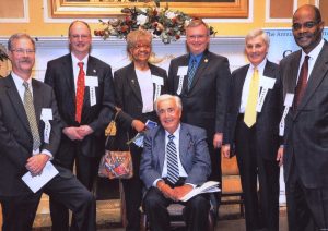 In 2011, Joe (back row, second from right) was among those honored with the Elder Law of Michigan Call to Justice award. Joe Cunningham being honored with Frank Kelley